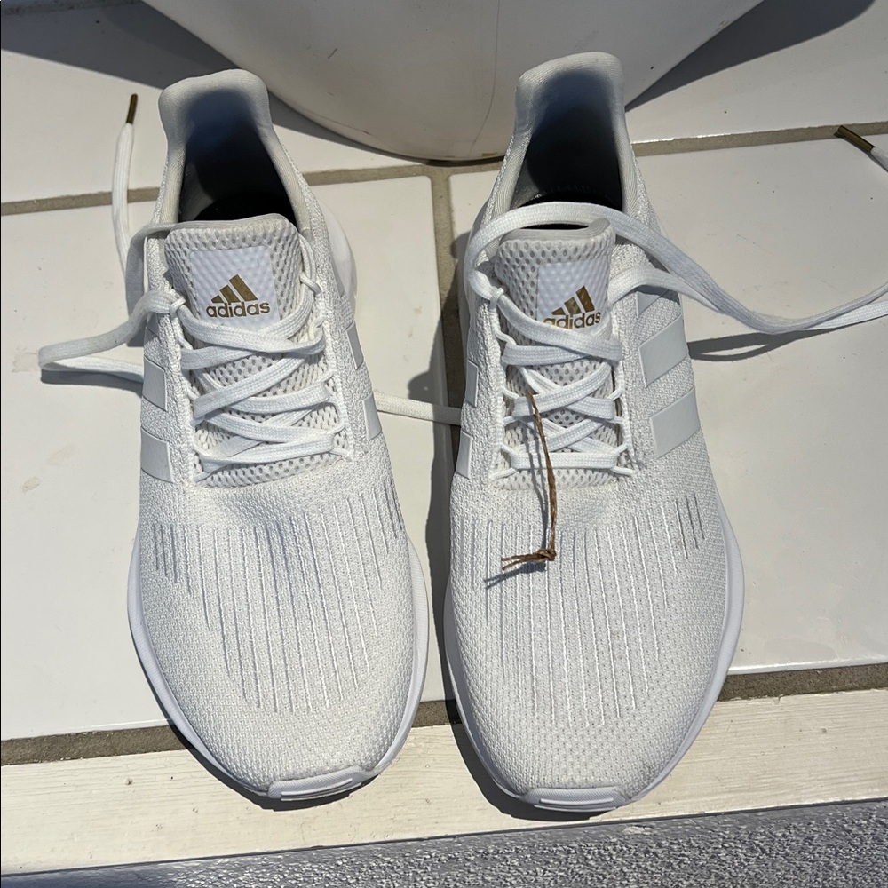Adidas White Swift 1.0. Running Shoes with Gold Accents